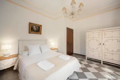 Cama o camas de una habitación en Villa La Gaviota - Oasis andaluz con piscina, jardín y barbacoa junto Ruta del Gollizno en Olivares