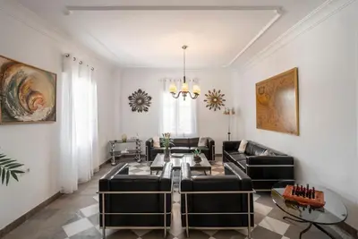 Zona de estar de Villa La Gaviota - Oasis andaluz con piscina, jardín y barbacoa junto Ruta del Gollizno en Olivares