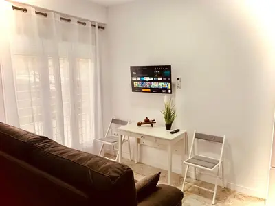 Una televisión o centro de entretenimiento en P&C APARTMENTS - Complejo Pintor Zurbarán