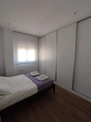 Cama o camas de una habitación en APARTAMENTO ANCHA CENTRO
