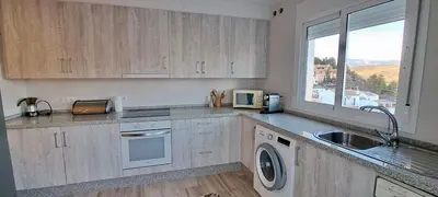 Una cocina o zona de cocina en Geysotur Casa de la Abuela Antonia