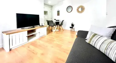 Una televisión o centro de entretenimiento en Residencial El Muro - Free Parking