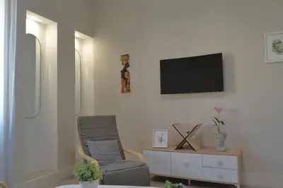 Una televisión o centro de entretenimiento en SunShine Capricho de las Tendillas