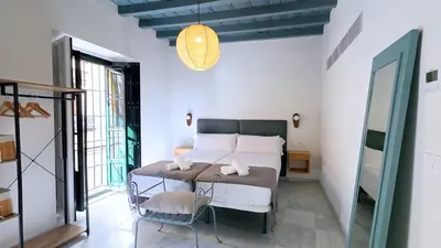 Cama o camas de una habitación en Casa en el Centro de Sevilla
