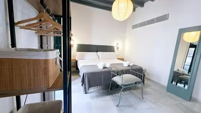 Cama o camas de una habitación en Casa en el Centro de Sevilla