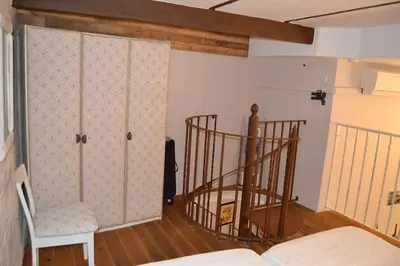 Cama o camas de una habitación en Loft en el centro de Sevilla