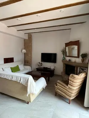 Una televisión o centro de entretenimiento en Casa Rural Verde Oliva