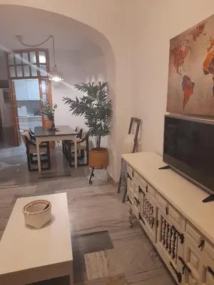 Una televisión o centro de entretenimiento en Vivienda típica cordobesa en LEIVA AGUILAR