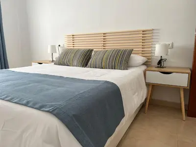 Cama o camas de una habitación en Apartamento San Agustín Nº 1