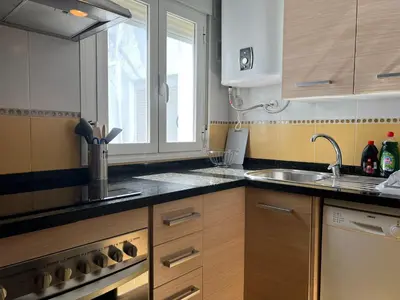 Una cocina o zona de cocina en Apartamento San Agustín Nº 1