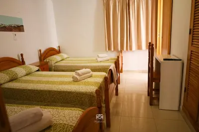 Cama o camas de una habitación en Hospedium DLJ Hostal Ben Nassar