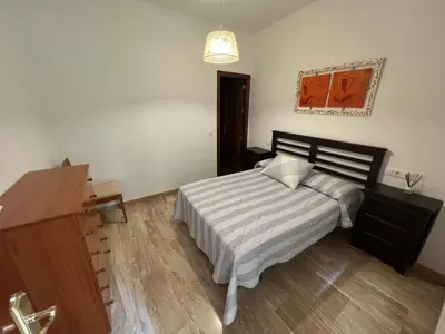 Cama o camas de una habitación en Apartamento Duplex El Porche