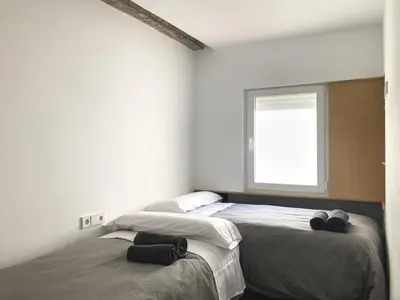 Cama o camas de una habitación en WISH SUITE AZAHAR DE SEVILLA
