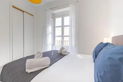 Cama o camas de una habitación en Muro city center suite by Valcambre