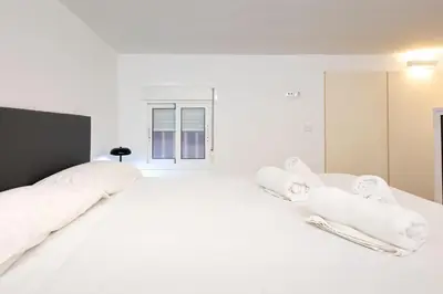 Cama o camas de una habitación en Heliotropo City Center Oasis by Valcambre