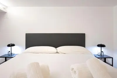 Cama o camas de una habitación en Heliotropo City Center Oasis by Valcambre