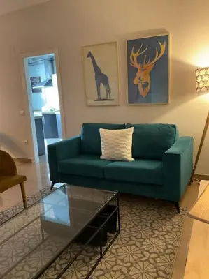 Zona de estar de Apt céntrico, a pie de calle.