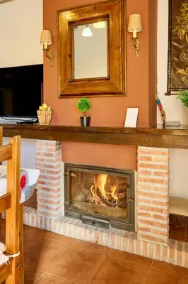 Una televisión o centro de entretenimiento en Apartamento Rural Villa Aurora