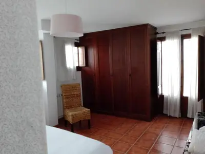 Cama o camas de una habitación en Claustro Home Casco Histórico Córdoba
