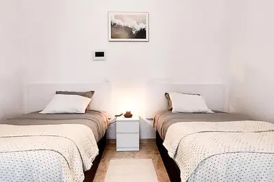 Cama o camas de una habitación en Ático Joaquín Costa 15 Alameda de Hércules