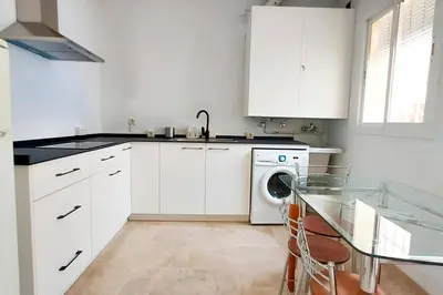 Una cocina o zona de cocina en Ático Joaquín Costa 15 Alameda de Hércules