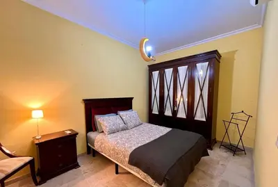 Cama o camas de una habitación en Apartamento Suite Alameda de Hercules