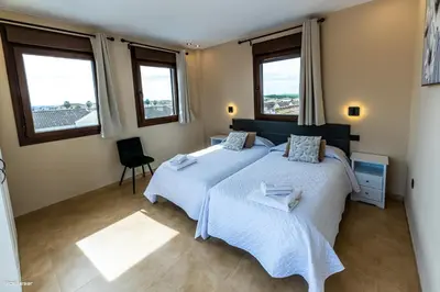 Cama o camas de una habitación en Villa Burguillos