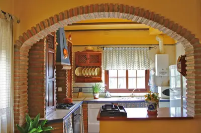 Una cocina o zona de cocina en Casa de la Noria