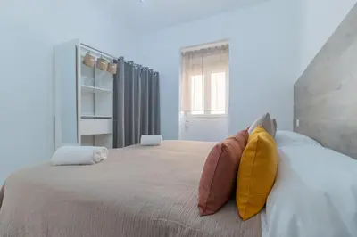 Cama o camas de una habitación en El Rinconcito