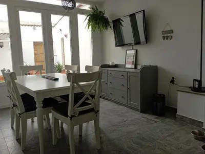Una televisión o centro de entretenimiento en Casa Rural Olivares