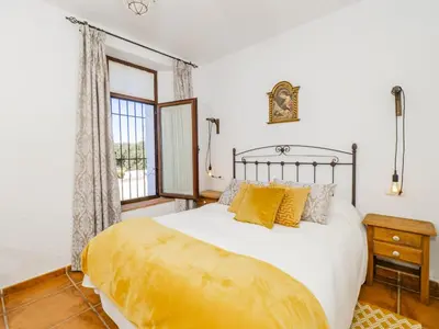 Cama o camas de una habitación en Cubo's El Baldio Country House - Setenil Bodegas