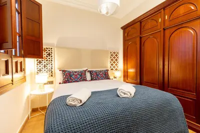 Cama o camas de una habitación en AoA Green Gardens Family House