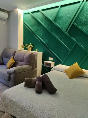 Cama o camas de una habitación en Duerme a gusto - Tu habitación acogedora en Torredonjimeno