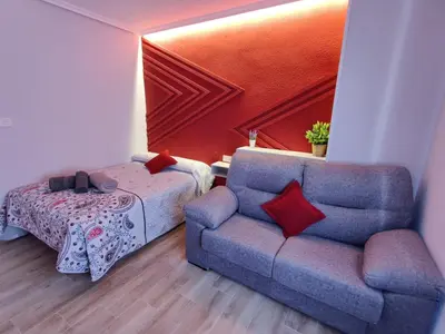 Zona de estar de Duerme a gusto - Tu habitación acogedora en Torredonjimeno
