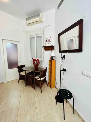 Una televisión o centro de entretenimiento en Apartamento Privado en Alameda de Hércules