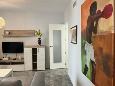 Una televisión o centro de entretenimiento en Apartamento La Pelota de Loren