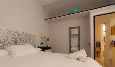 Cama o camas de una habitación en Modern apartment in City Centre
