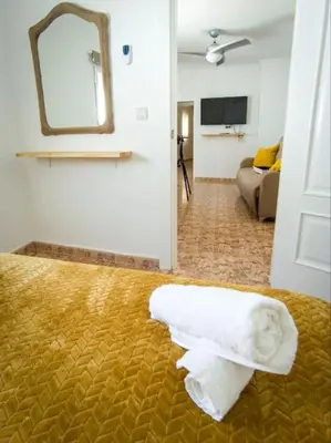 Cama o camas de una habitación en La Tienda de Miguel