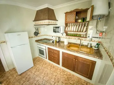 Una cocina o zona de cocina en La Tienda de Miguel