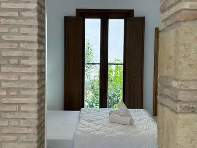 Cama o camas de una habitación en La Casa de La Escalera 4