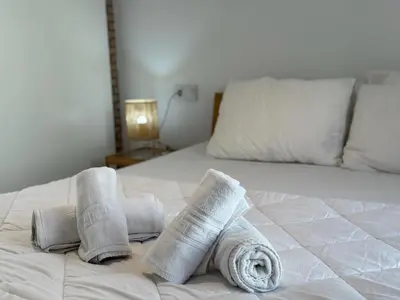 Cama o camas de una habitación en La Casa de La Escalera 4