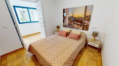 Cama o camas de una habitación en Apartamento LA TERRAZA 2 dormitorios
