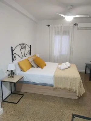 Cama o camas de una habitación en GRUPO LIMCOTEL EL PASEITO DE CONCHA-MEsQUITA-PARKING