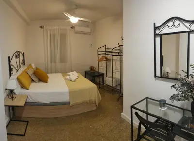 Cama o camas de una habitación en GRUPO LIMCOTEL EL PASEITO DE CONCHA-MEsQUITA-PARKING