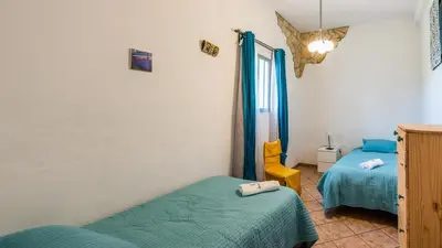Cama o camas de una habitación en Villa Fablas Periana by Ruralidays