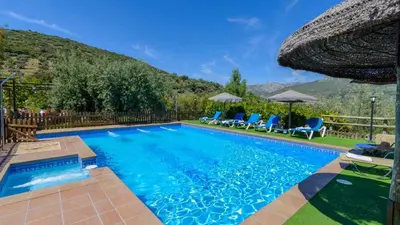 Piscina en o cerca de Cortijo Palitroques Carcabuey by Ruralidays