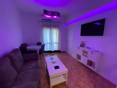 Una televisión o centro de entretenimiento en COSTASOL CORDOBA - Apartamento moderno - céntrico