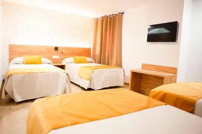 Cama o camas de una habitación en PENSION RESTAURANTE ANGEL