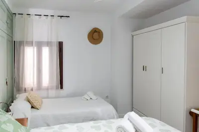 Cama o camas de una habitación en Apart Mezquita con Parking Gratuito