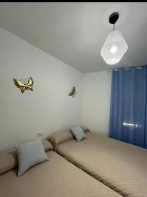 Cama o camas de una habitación en El capricho de Olga